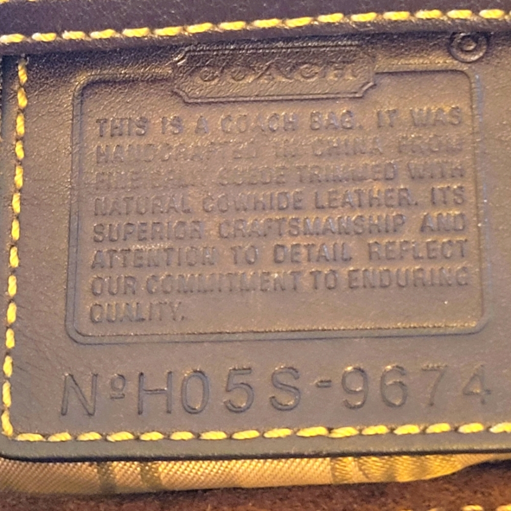 Coach dark brown suede purse, pristine condition.